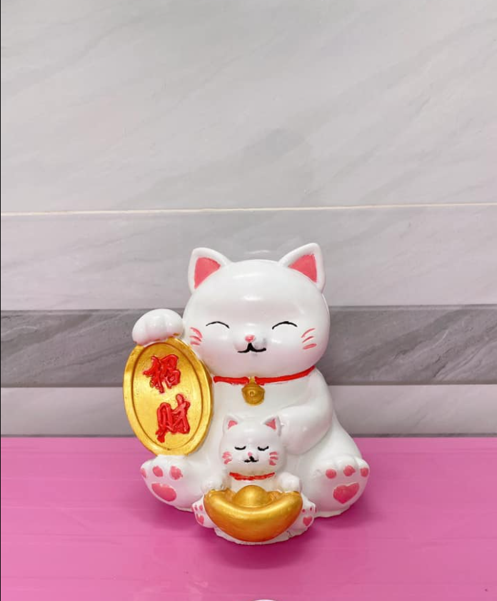 Tượng mèo thần tài vẫy tay